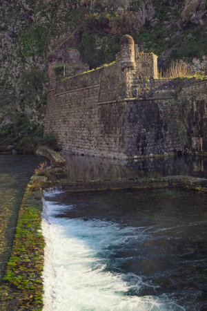 Ancient fortifications. Montenegro, Old Town of Kotor, Skurda river . Winter view of Northern walls of fortress and Riva bastionの写真素材