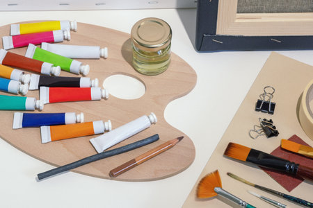 Different materials  for art and creativity: canvas, paints, paintbrushes, paletteの写真素材