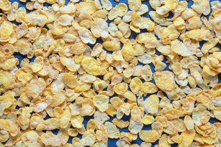 Corn flakes on dark table, backgroundの写真素材