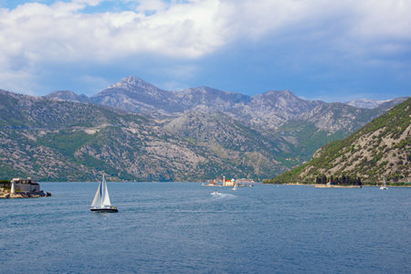 Beautiful Mediterranean landscape. Montenegro, Adriatic Sea. Bay of Kotor near Verige Strait on cloudy spring dayの写真素材