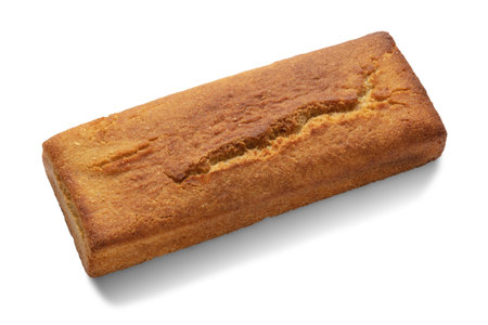 Loaf of cornbread isolated on whiteの写真素材