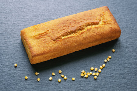 Loaf of cornbread on dark table. Copy spaceの写真素材
