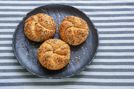Kaiser rolls (Emperor roll, kajzerica), crusty round bread rolls. Copy space