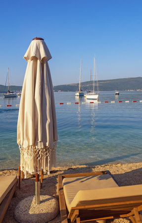Summer beach vacation. Beautiful sunny Mediterranean landscape. Montenegro, Adriatic Sea. Coast of Bay of Kotor, Tivatの写真素材