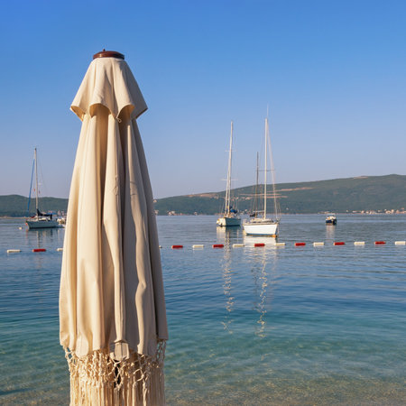 Beautiful sunny Mediterranean landscape. Summer beach vacation. Montenegro, Adriatic Sea. View of Bay of Kotor near Tivat cityの写真素材