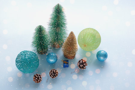 Christmas decorations. Colorful Christmas baubles. Festoon illumination, double exposure. Copy spaceの写真素材