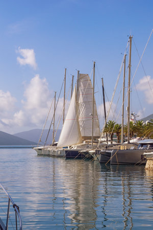 Beautiful  Mediterranean landscape. Sailboats on water. Montenegro, Adriatic Sea. Bay of Kotor, Porto Montenegro marina in Tivat cityの写真素材