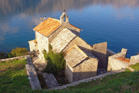 Ancient Church of Our Lady of the Angels on coast of Kotor Bay. Montenegro, Adriatic Seaの写真素材