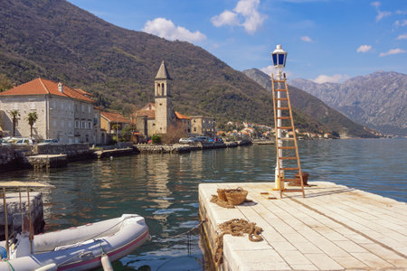 Beautiful Mediterranean landscape on sunny spring day. Montenegro, Adriatic Sea. View of Kotor Bay and Stoliv townの写真素材