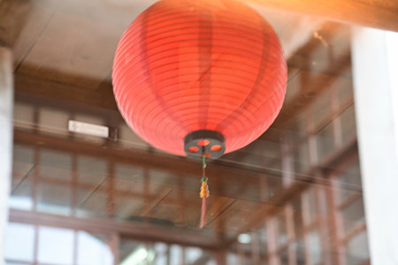 Window reflection of the traditional Chinese lantern. Colorful lanterns. Festive decoration....
