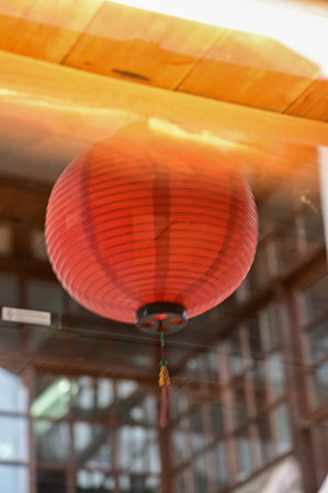 Window reflection of the traditional Chinese lantern. Colorful lanterns. Festive decoration. Mid-autumn festival decoration,Chinese New Year decoration, for celebration.の写真素材