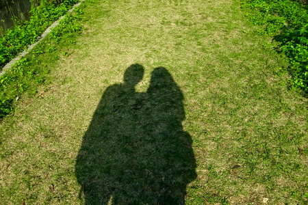 The shadow of a couple in the rural. Relationship concept.の写真素材