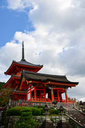 The view of kiyomizu-dera temple with trees and blue sky background in Kyoto, Japan. Major tourist attraction in Kansai region in Japan. Japan famous historic architecture.の写真素材