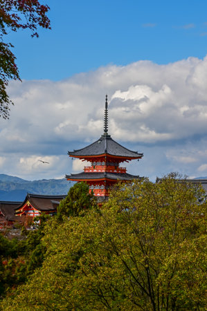 The view of kiyomizu-dera temple with trees and blue sky background in Kyoto, Japan. Major tourist attraction in Kansai region in Japan. Historic architecture.の写真素材