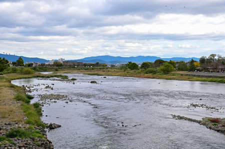 The view of Katsura River at autumn from Togetsukyo Bridge, Kyoto, Japan. A well-known place of scenic beauty in the western hills of Kyoto. Nature and travel concept.の写真素材