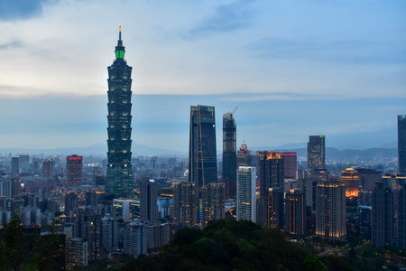 Aerial view of skyline of Taipei city with Taipei 101 Skyscraper at sunset from Xiangshan Elephant Mountain. Beautiful landscape and cityscape of Taipei downtown buildings