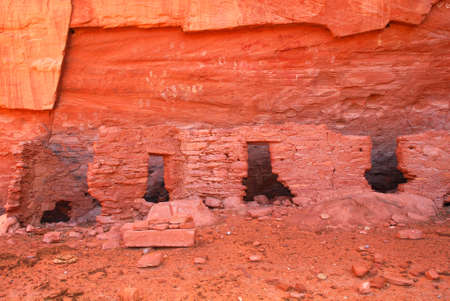 Ancient Navajo Anasazi dwelling with petroglyphs in Mystery Valleyの写真素材