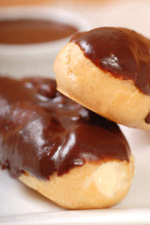 Two delicious homemade eclairs with a chocolate ganache