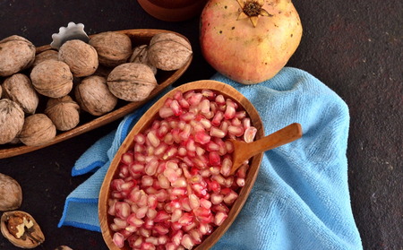 pomegranate and nuts for breakfastの写真素材