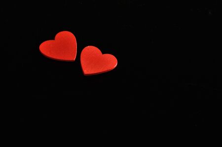 red hearts on black backgroundの写真素材
