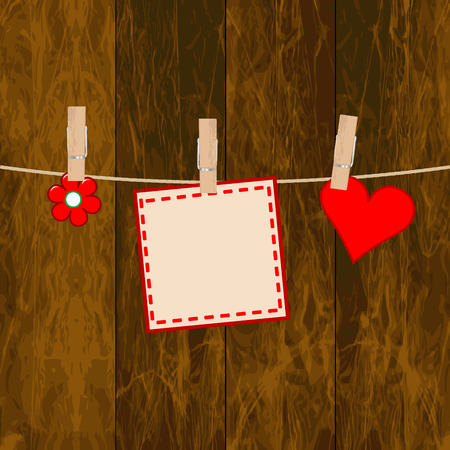 Note paper, flower and heart on the wooden background with clothespinsのイラスト素材