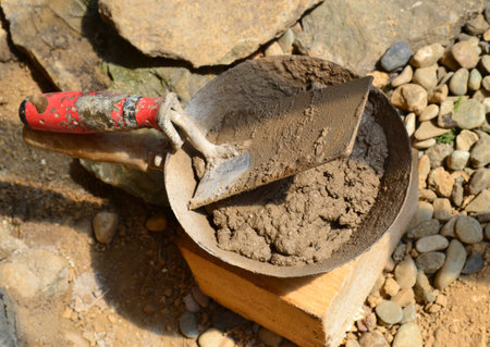 Trowel and ladle, plastering toolsの写真素材