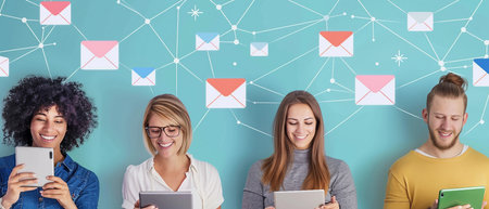 Group of people using digital devices against blue background with vignetteの素材