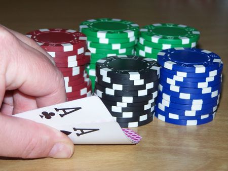 poker hand and chips