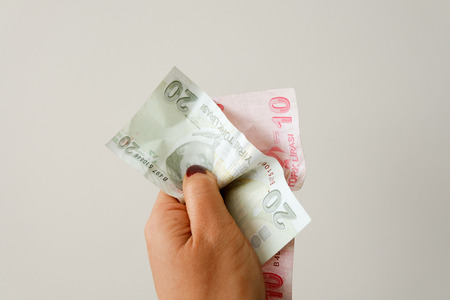 Hand holding notesの写真素材