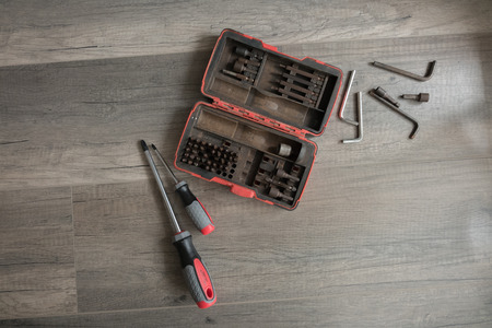 repair equipment on wooden backgroundの写真素材