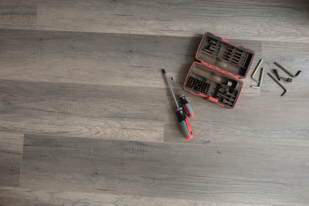 repair equipment on wooden backgroundの写真素材