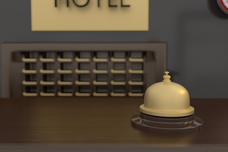 3D rendering of golden bell at hotel receptionの写真素材