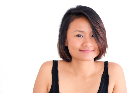 Woman on white background, smilingの写真素材