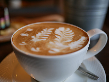 The Texture of Latte art leaf on The Top of Hot Coffeeの写真素材