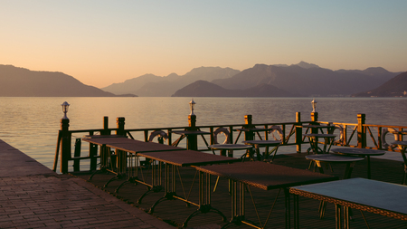 tables on terrace for relaxation outdoor with sea viewの写真素材