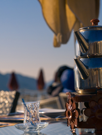 Turkish tea glass with double turkish tea potの写真素材