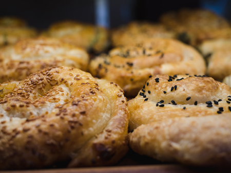 Fresh healthy pastry on a shelf in bakery shop