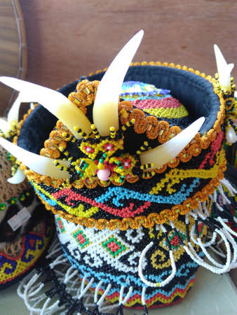 custom decorative hat area decorated with animal bones and beadsの写真素材