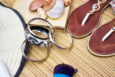 Ready for beach-flip flops, book and the hat
