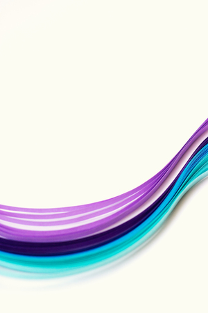 Shades of blue and violet paper stripes on white background; abstract lines background