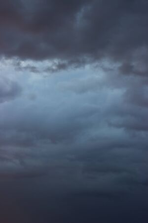 Amazing dramatic dark gray sky after stormの写真素材