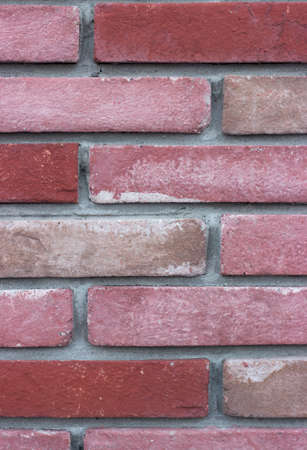 Close up of a pink brick wall