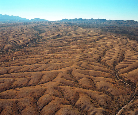 Aerial view of rugged mountain terrain southeast of Tucson, Arizonaの写真素材