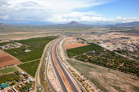 Widening of the Red Mountain freeway viewed from above in Mesa, Arizonaの写真素材