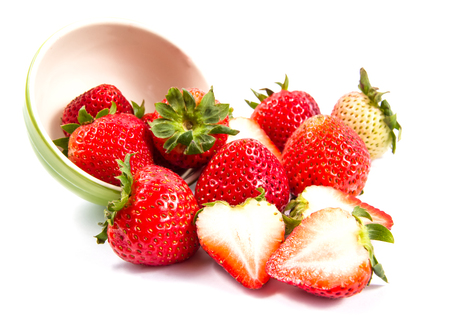 bowl with strawberries isolated on white backgroundの写真素材