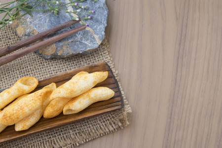Snack on a wooden tableの写真素材