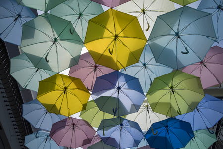 Street decorated with colored umbrellasの写真素材