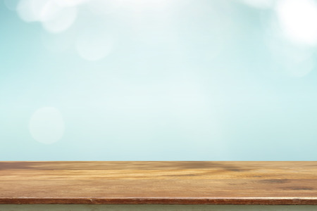 Wood table top on blur nature background, used for montage or display your productsの写真素材
