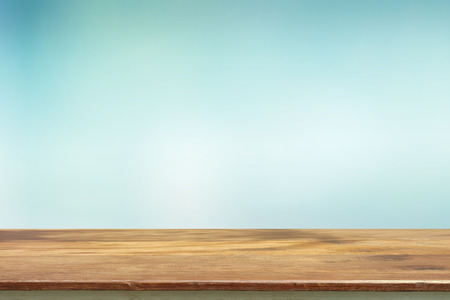 Wood table top on blur nature background, used for montage or display your productsの写真素材