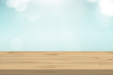 Wood table top on blur nature background, used for montage or display your productsの写真素材